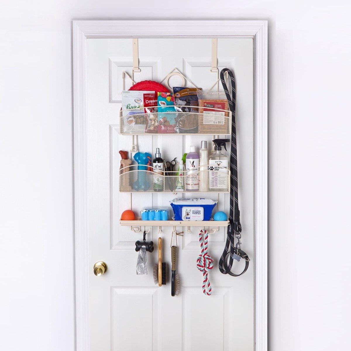 Over door organiser holding dog supplies