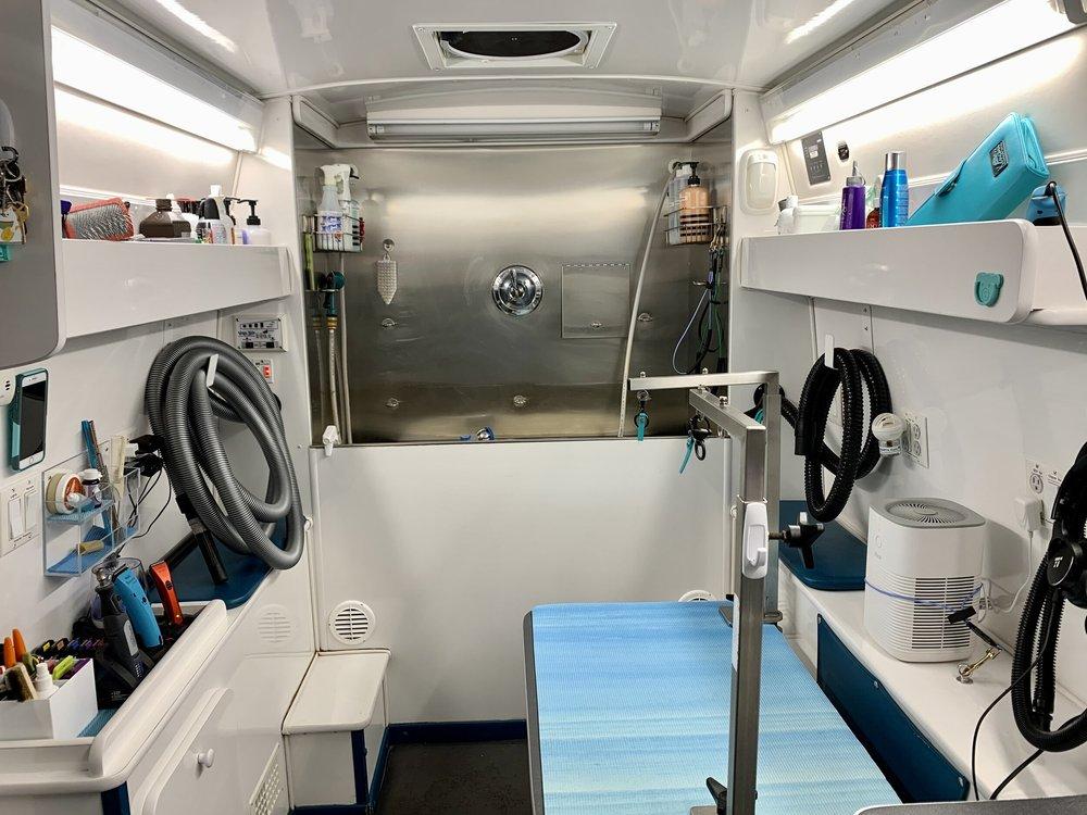 Mobile grooming room setup for small dogs