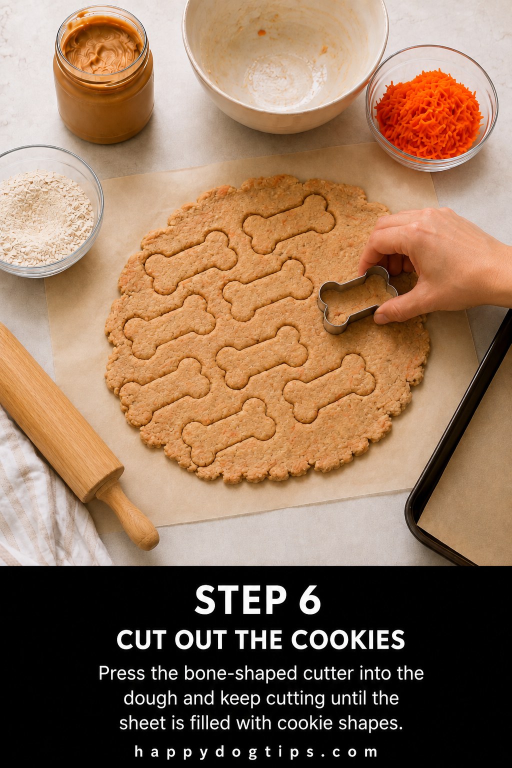 Cutting bone shaped peanut butter banana dog cookies from rolled dough with a metal cutter