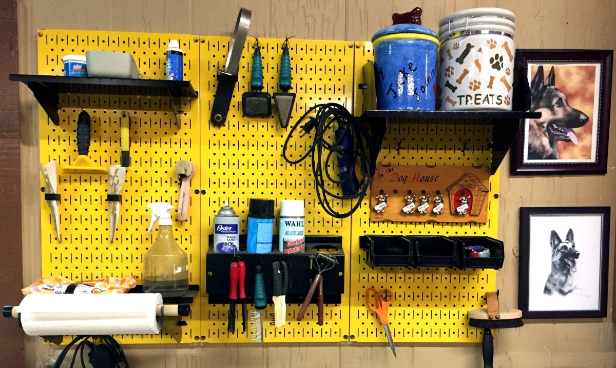 Vertical storage in small dog grooming room