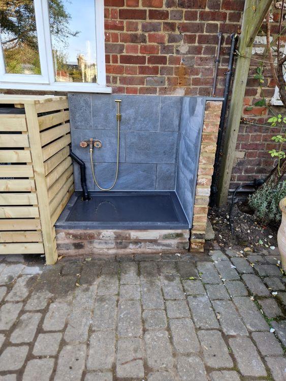 Stone patio dog wash station